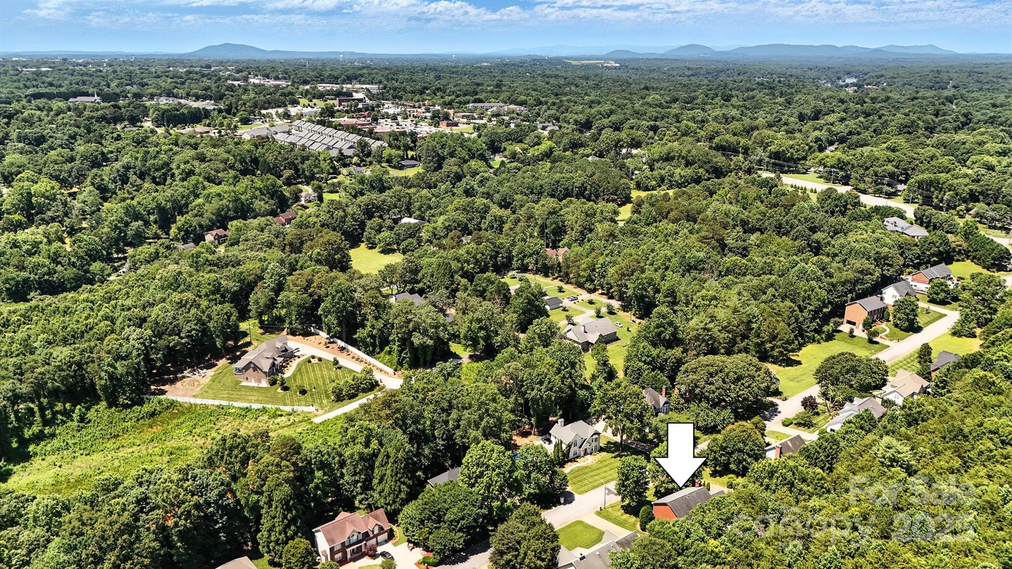 147 35th Avenue Northeast Hickory, NC 28601 - Photo 43 of 43 an aerial view of a houses with a yard and mountain