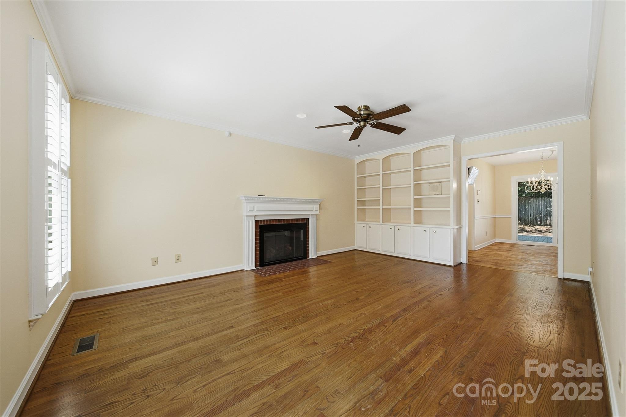 147 35th Avenue Northeast Hickory, NC 28601 - Photo 7 of 43 wooden floor in an empty room with a window