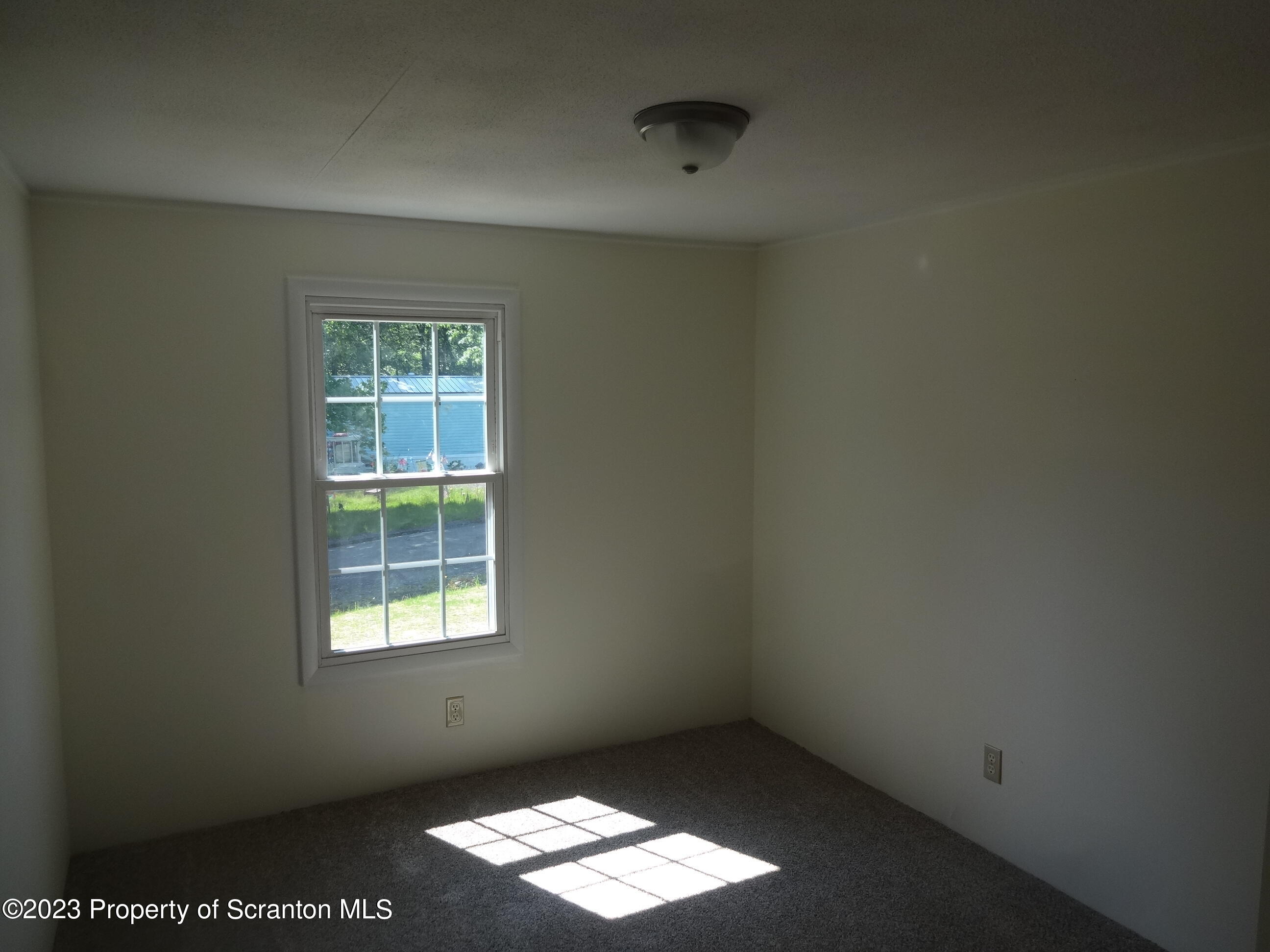 10 Center Street Lake Ariel, PA 18436 - Photo 12 of 18 an empty room with a window