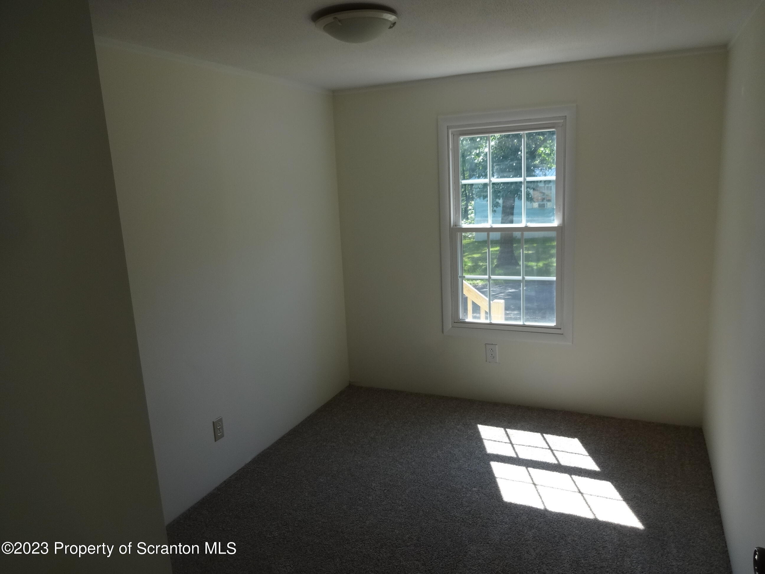 10 Center Street Lake Ariel, PA 18436 - Photo 10 of 18 an empty room with a window