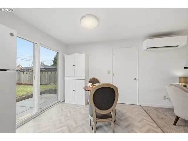 a view of kitchen and wooden floor