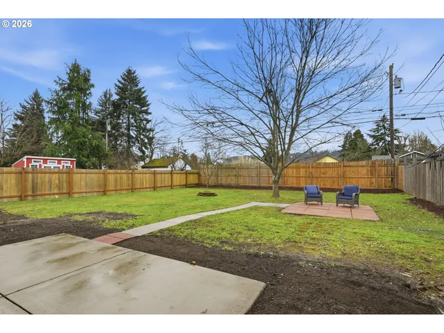 a view of yard with tree s