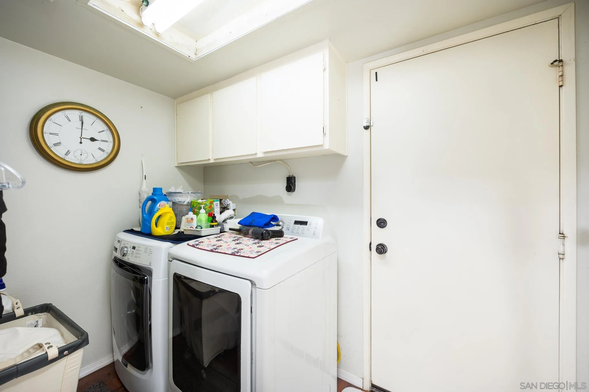 5063 Frazee Road Oceanside, CA 92057 - Photo 19 of 45 a utility room with dryer and washer