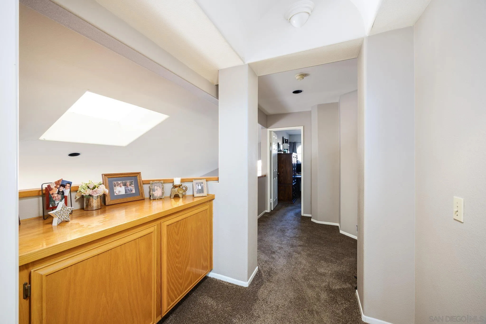 5063 Frazee Road Oceanside, CA 92057 - Photo 20 of 45 a kitchen with a sink and refrigerator