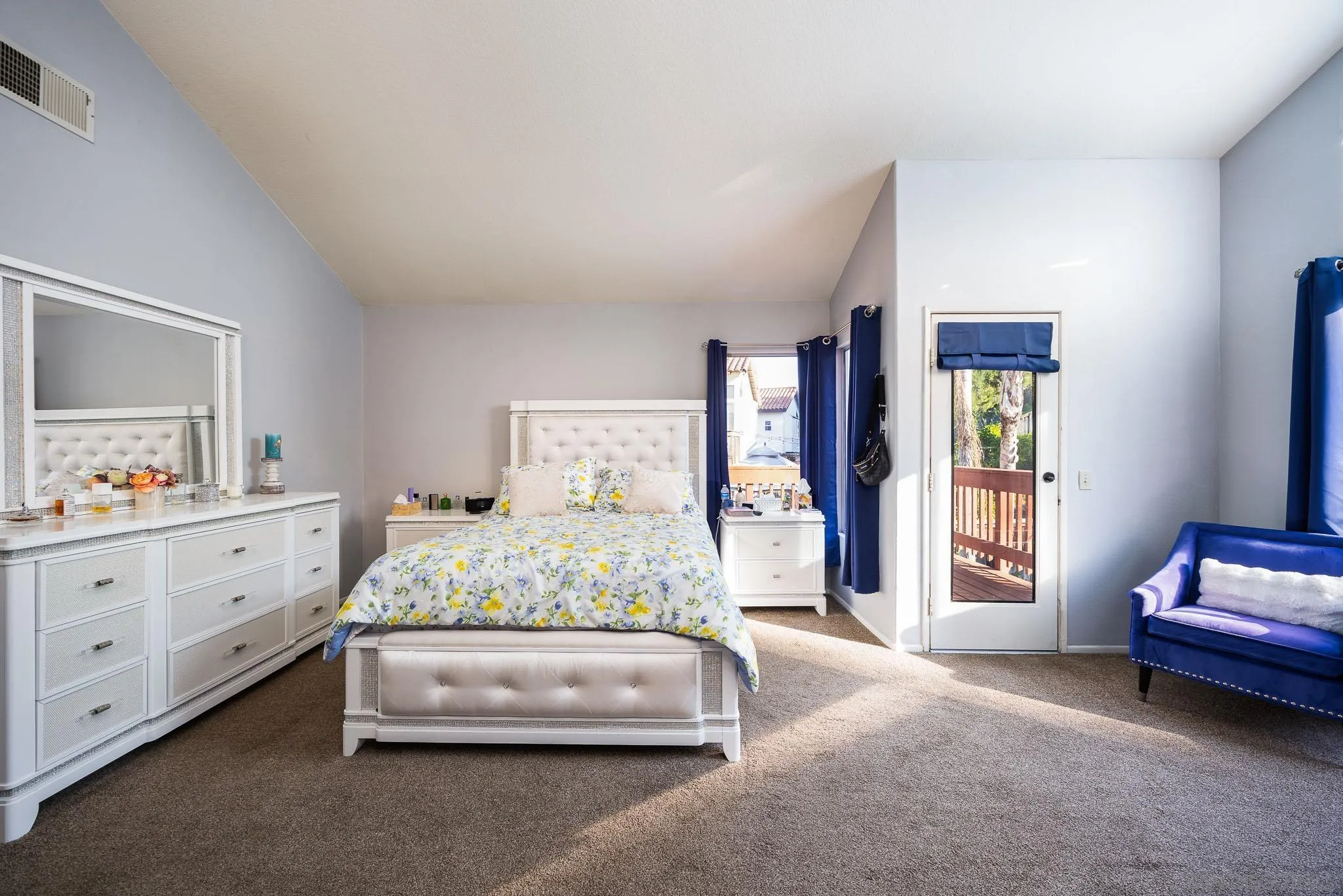 5063 Frazee Road Oceanside, CA 92057 - Photo 22 of 45 a bedroom with a bed and a window