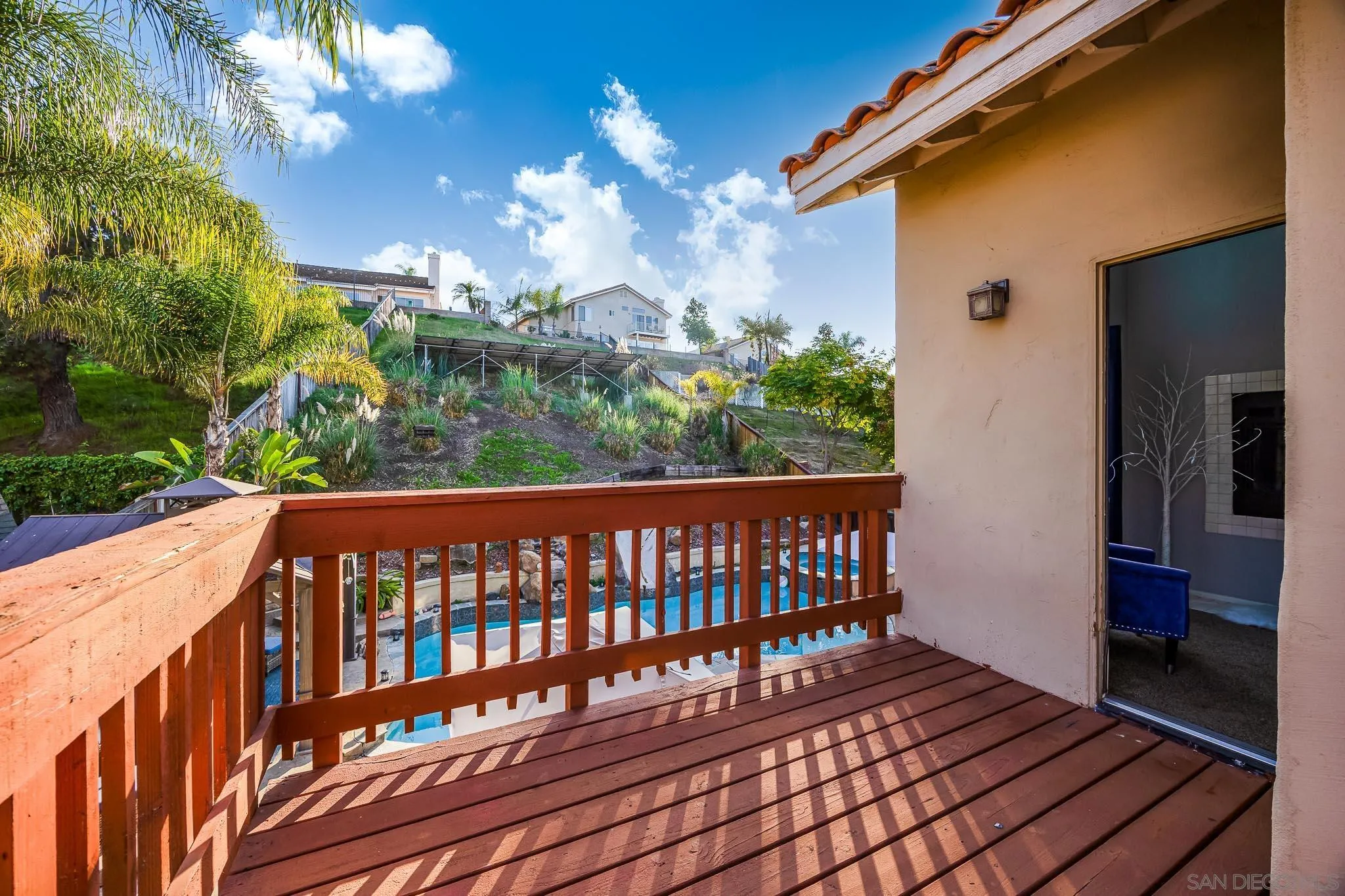 5063 Frazee Road Oceanside, CA 92057 - Photo 24 of 45 a view of a balcony with wooden floor