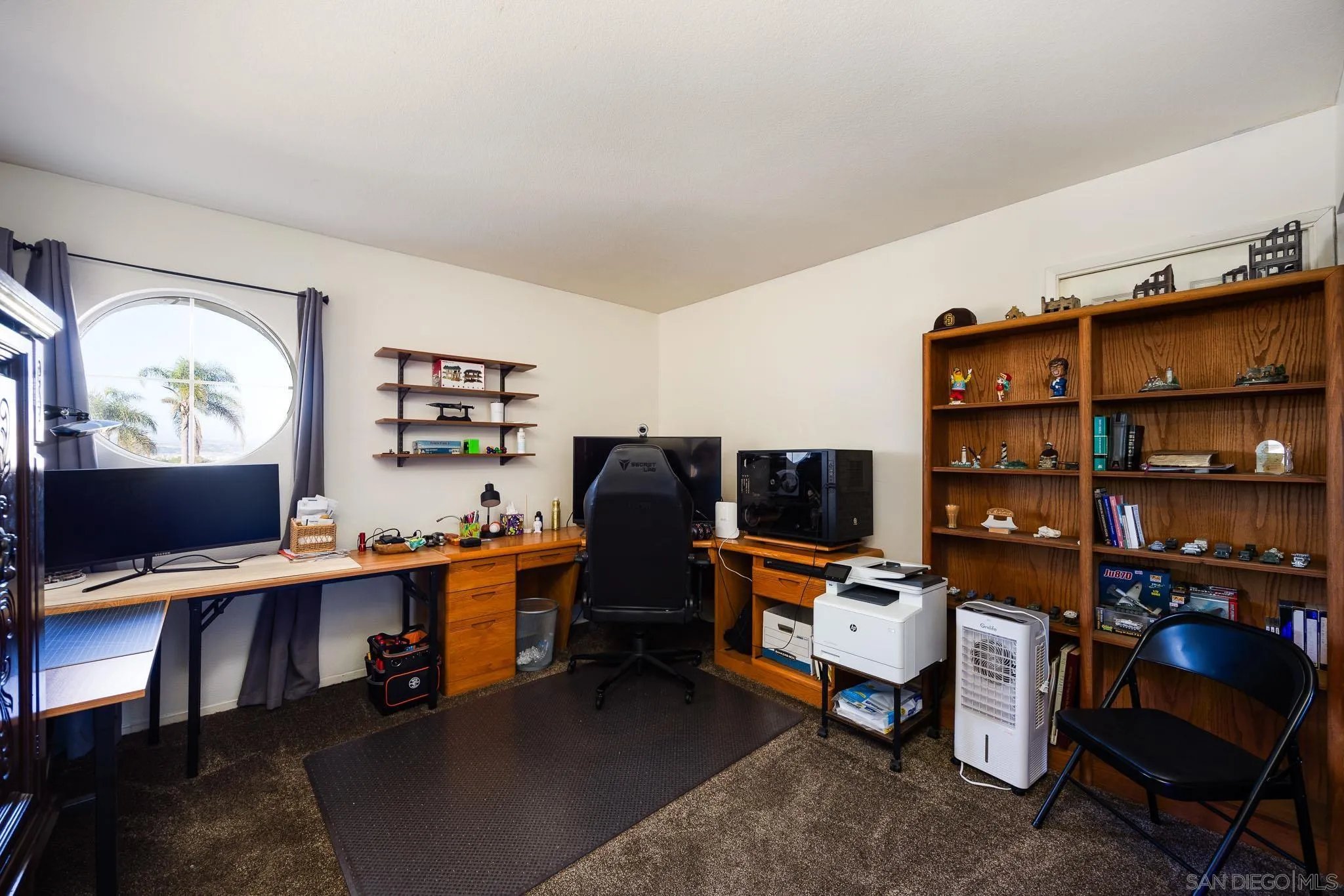 5063 Frazee Road Oceanside, CA 92057 - Photo 29 of 45 a view of a workspace with furniture