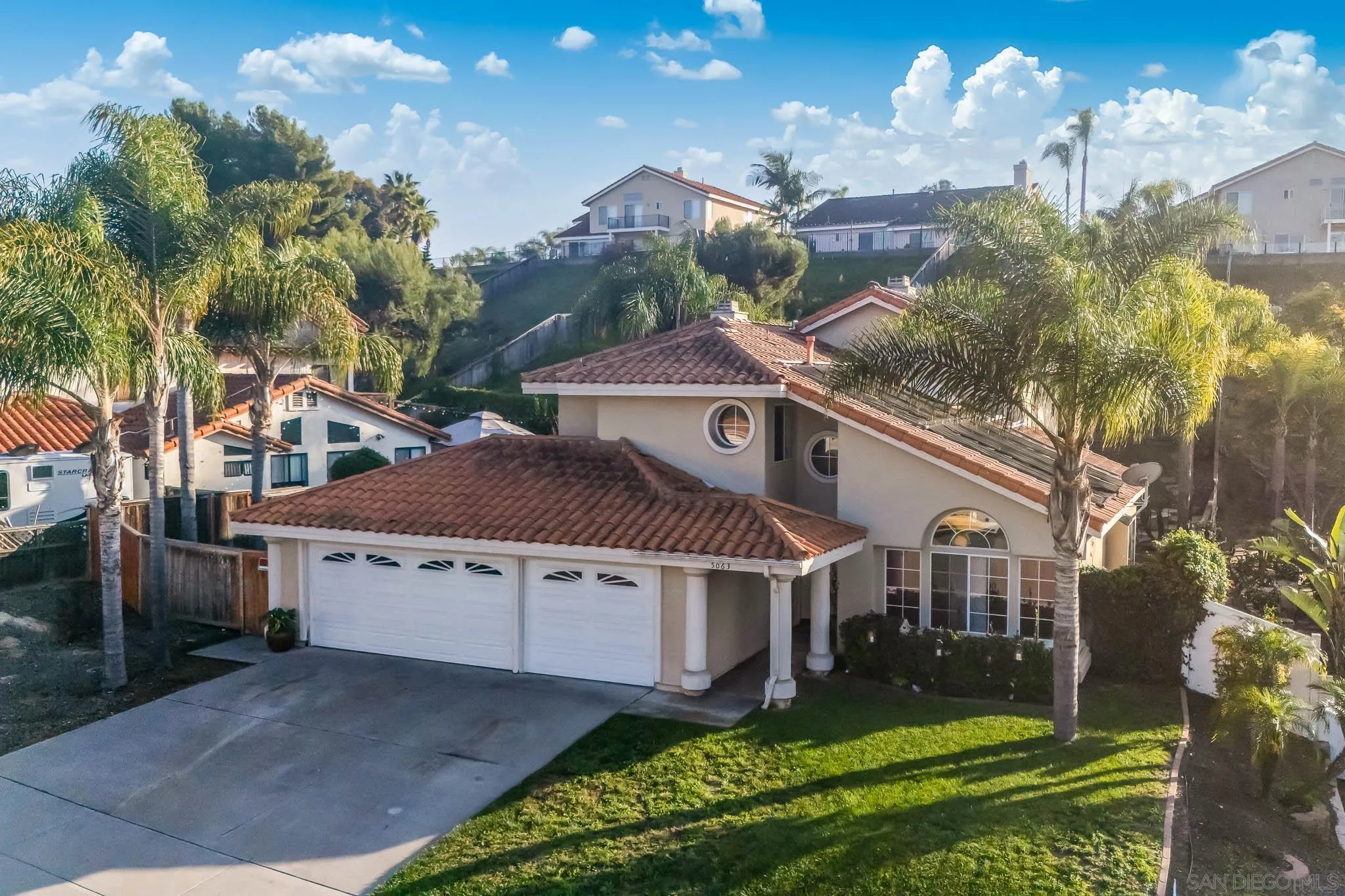 5063 Frazee Road Oceanside, CA 92057 - Photo 42 of 45 a view of house with yard in front of it