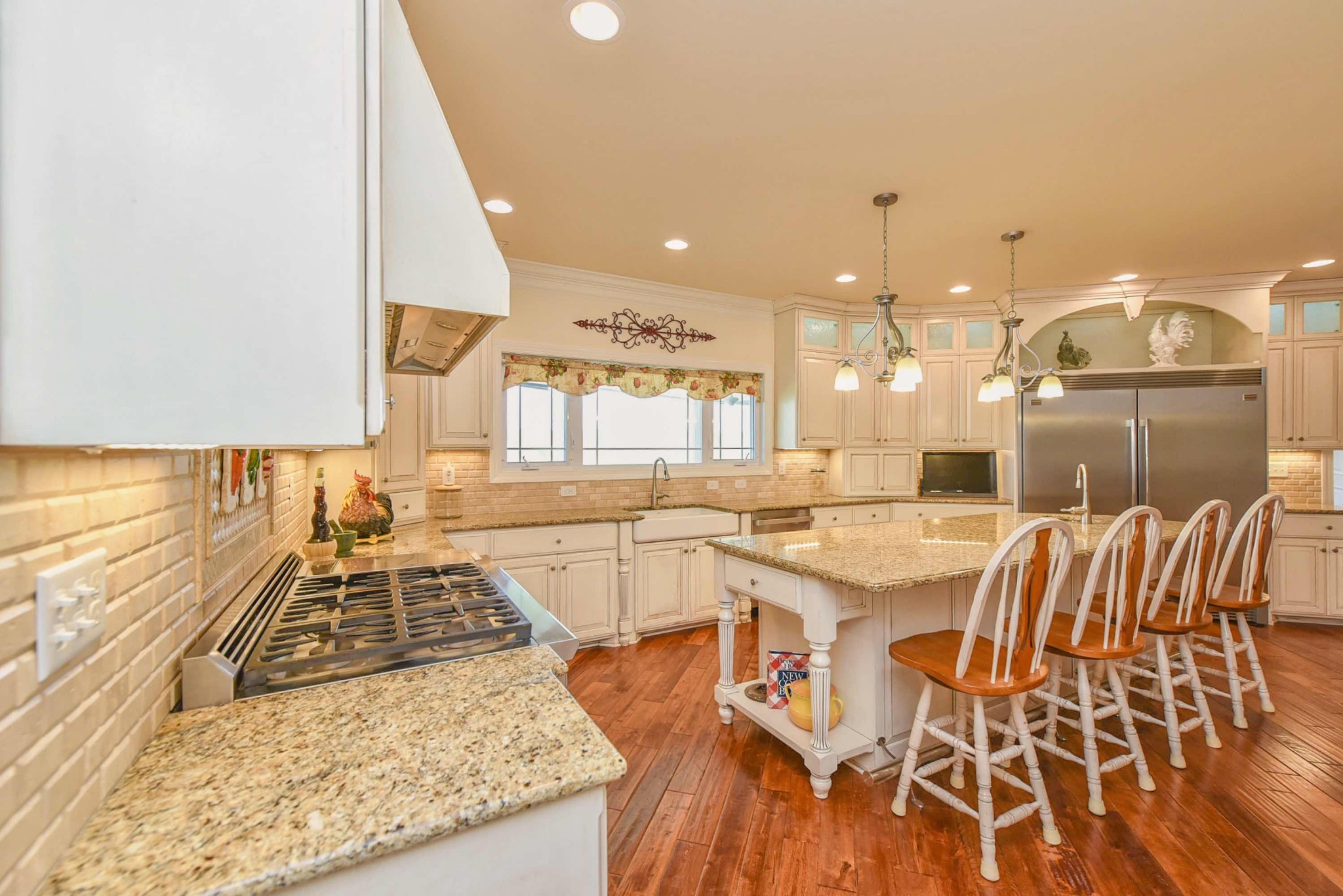 2682 Maple Grove Road Dickson, TN 37055 - Photo 15 of 50 a kitchen with a sink and a stove top oven