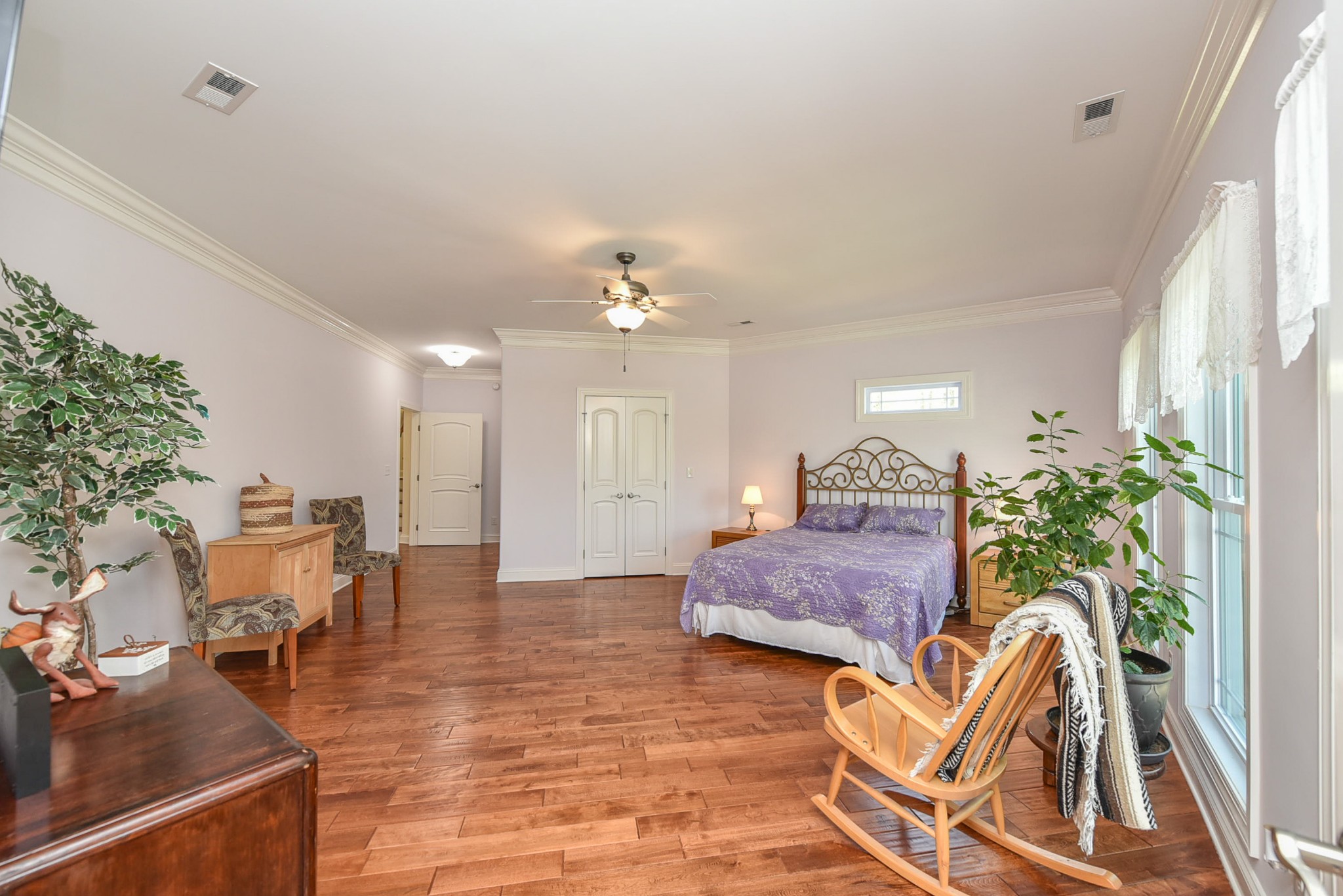 2682 Maple Grove Road Dickson, TN 37055 - Photo 28 of 50 a living room with furniture and a chandelier