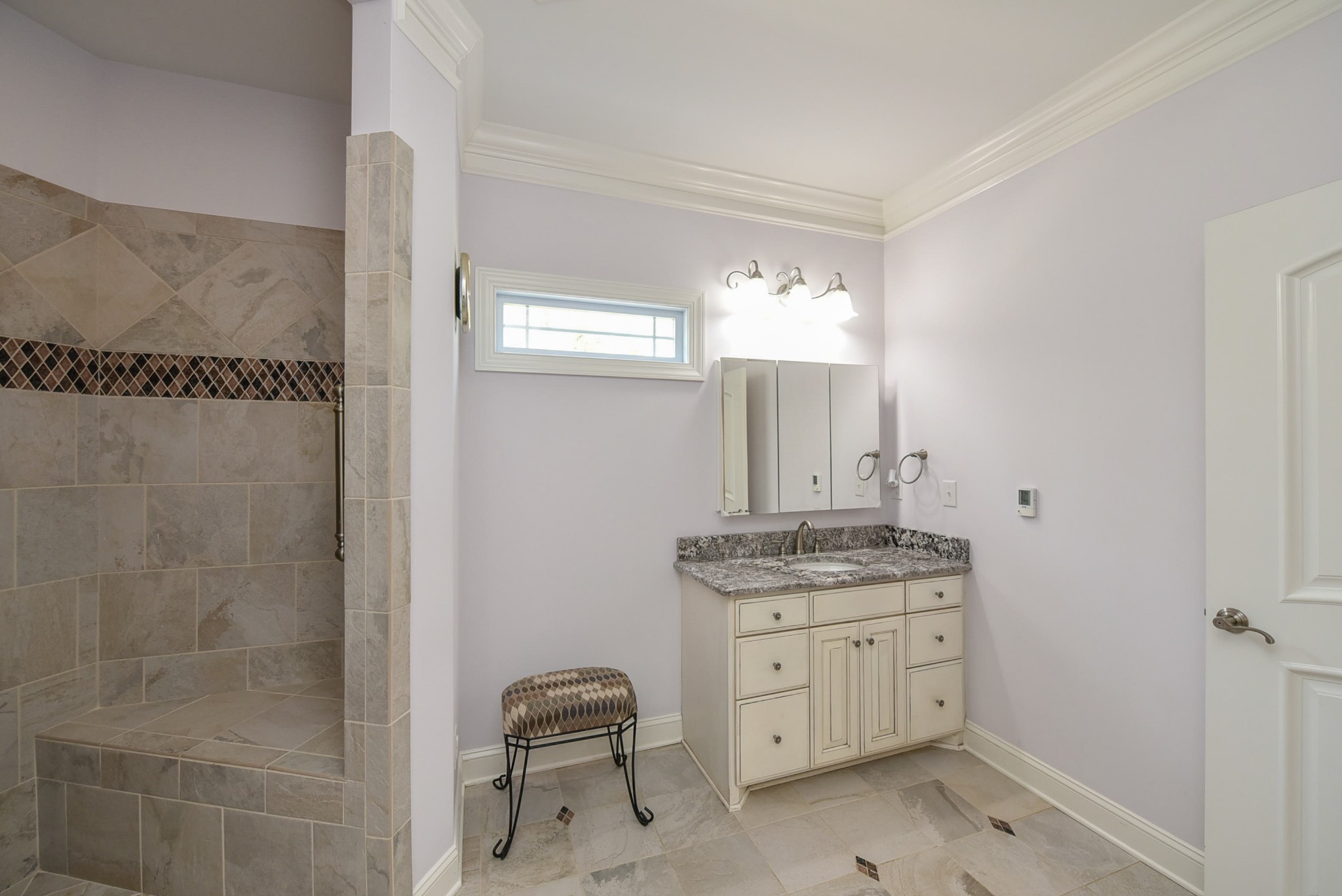 2682 Maple Grove Road Dickson, TN 37055 - Photo 31 of 50 a bathroom with a granite countertop sink a toilet and a mirror