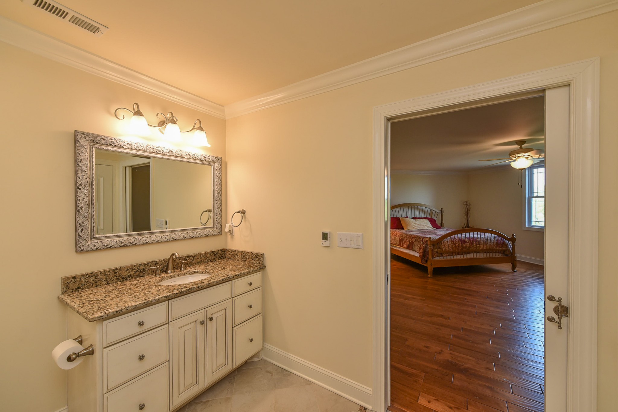 2682 Maple Grove Road Dickson, TN 37055 - Photo 35 of 50 a en suite bathroom with a granite countertop sink and a mirror