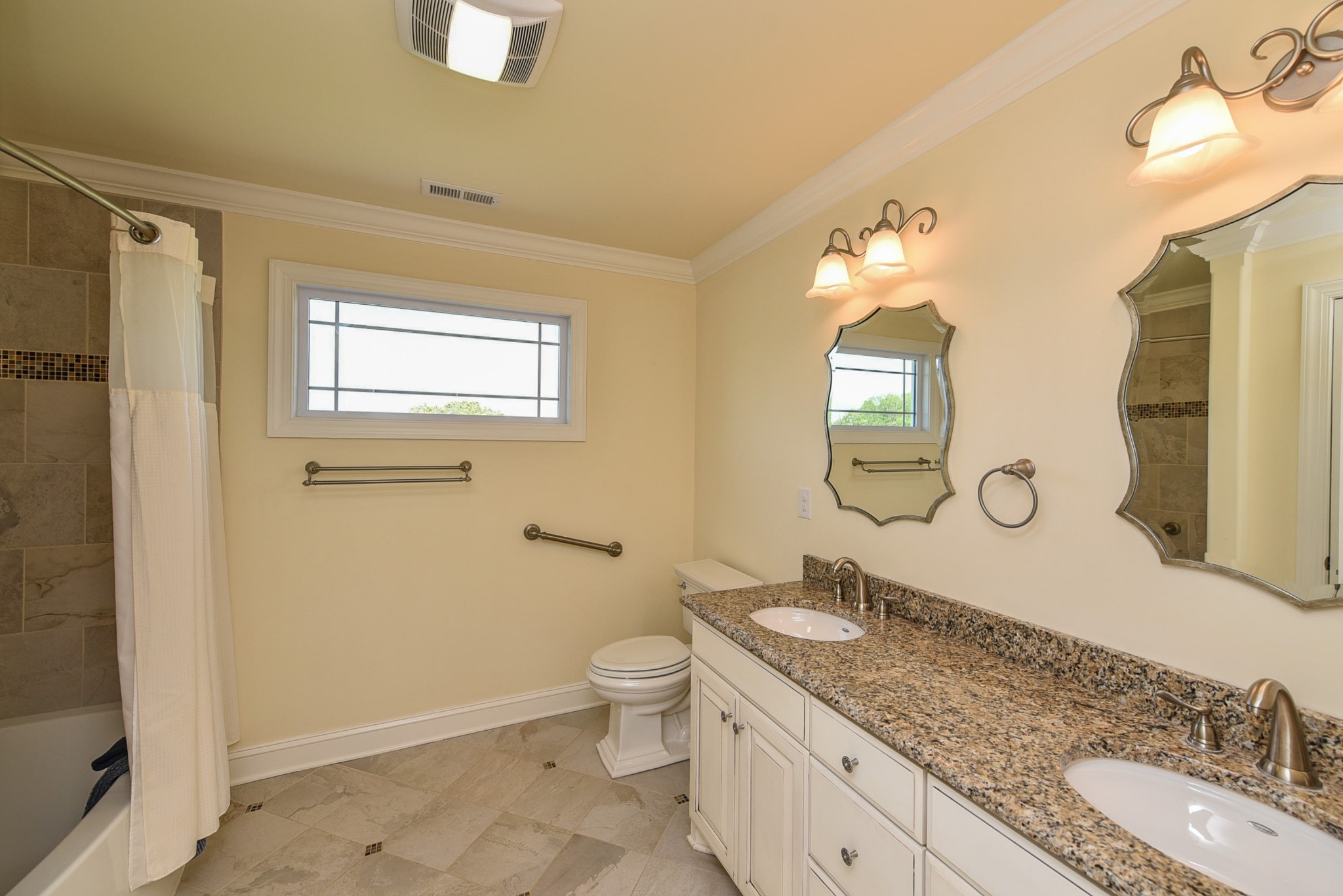 2682 Maple Grove Road Dickson, TN 37055 - Photo 41 of 50 a bathroom with a granite countertop sink toilet and mirror