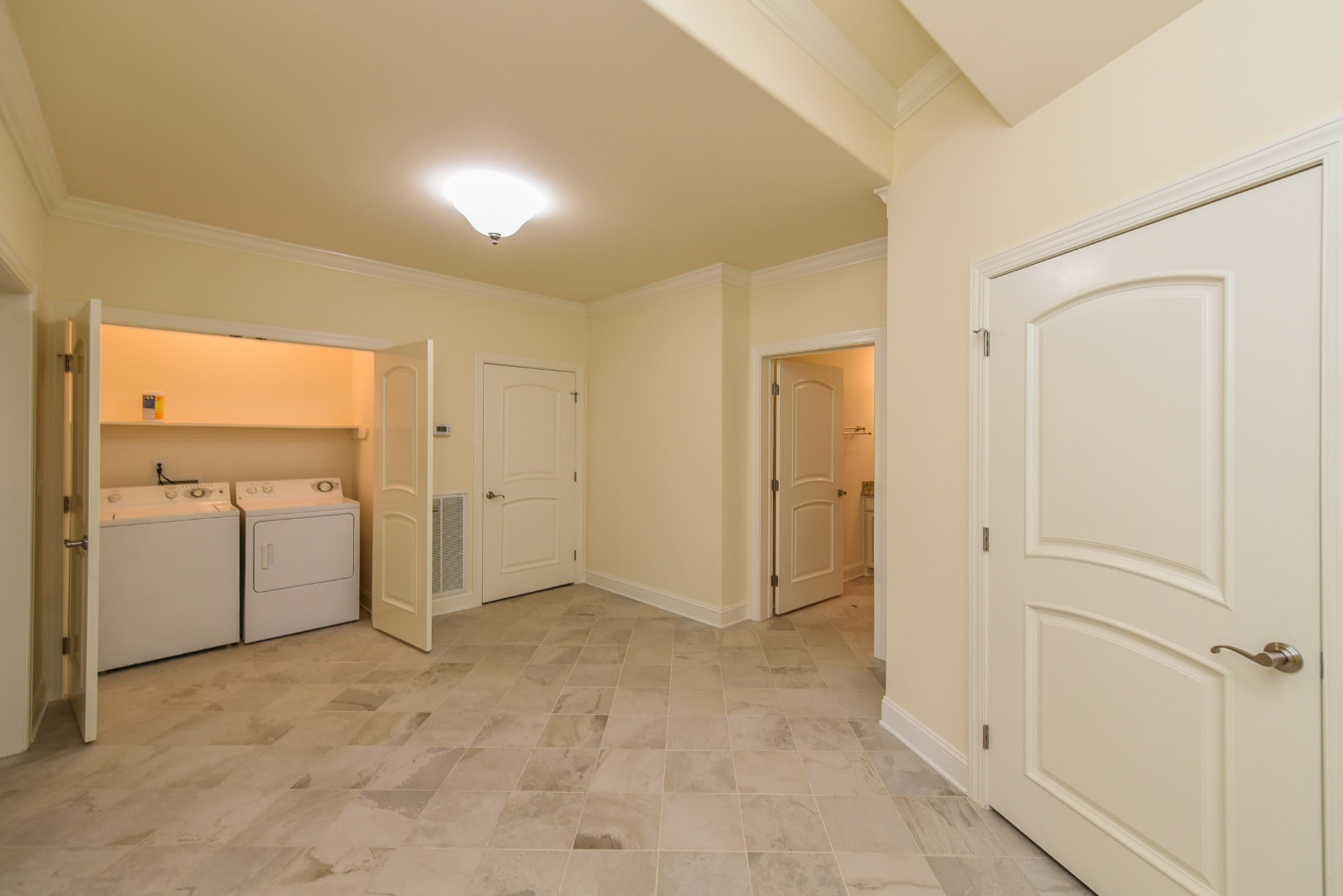 2682 Maple Grove Road Dickson, TN 37055 - Photo 46 of 50 a view of a kitchen with a sink and a refrigerator