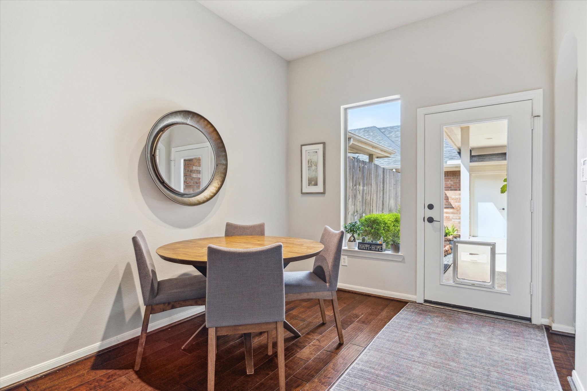 3310 Spring Landing Lane Pearland, TX 77584 - Photo 19 of 32 Breakfast/Dining space with backyard/patio connection—perfect for indoor/outdoor flow during entertaining.