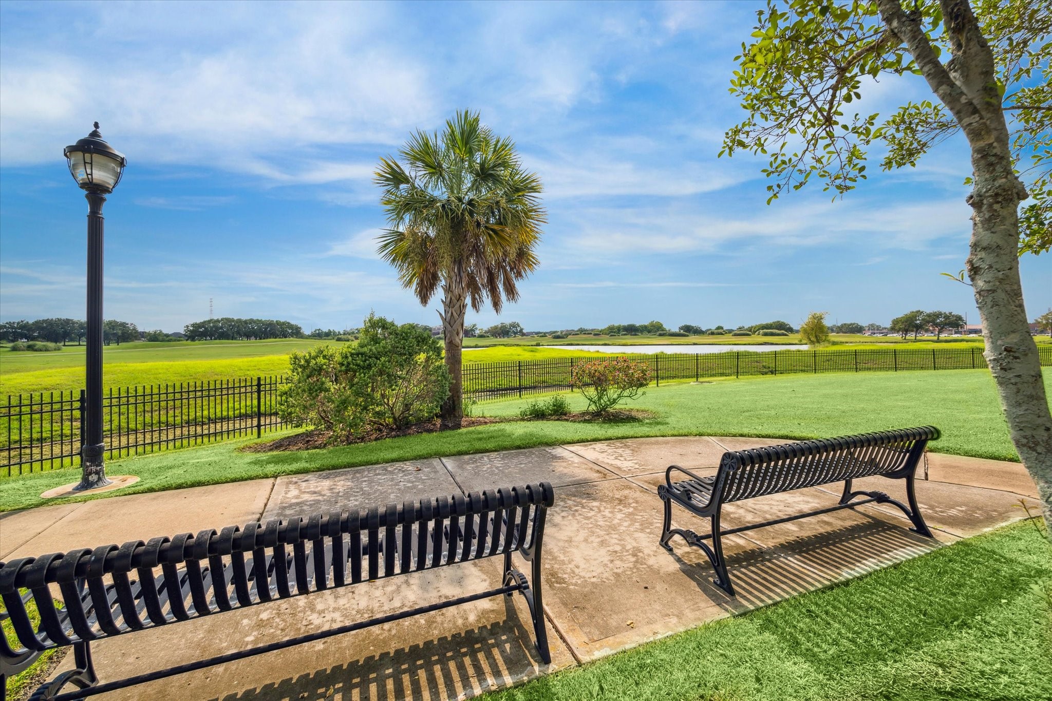3310 Spring Landing Lane Pearland, TX 77584 - Photo 21 of 32 Bench seating overlooking the Golf Course—enjoy wide open views and peaceful surroundings.