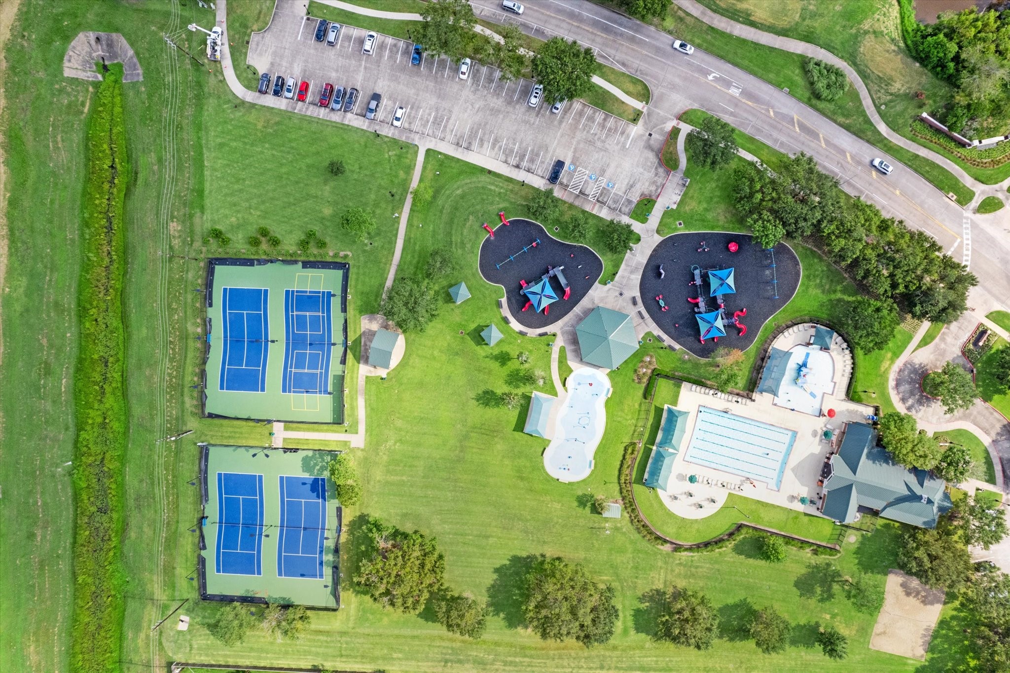 3310 Spring Landing Lane Pearland, TX 77584 - Photo 31 of 32 Recreation area photo showing courts/pavilion space; listing notes access to Aerial view of Silverlake pool, tennis, pickleball.