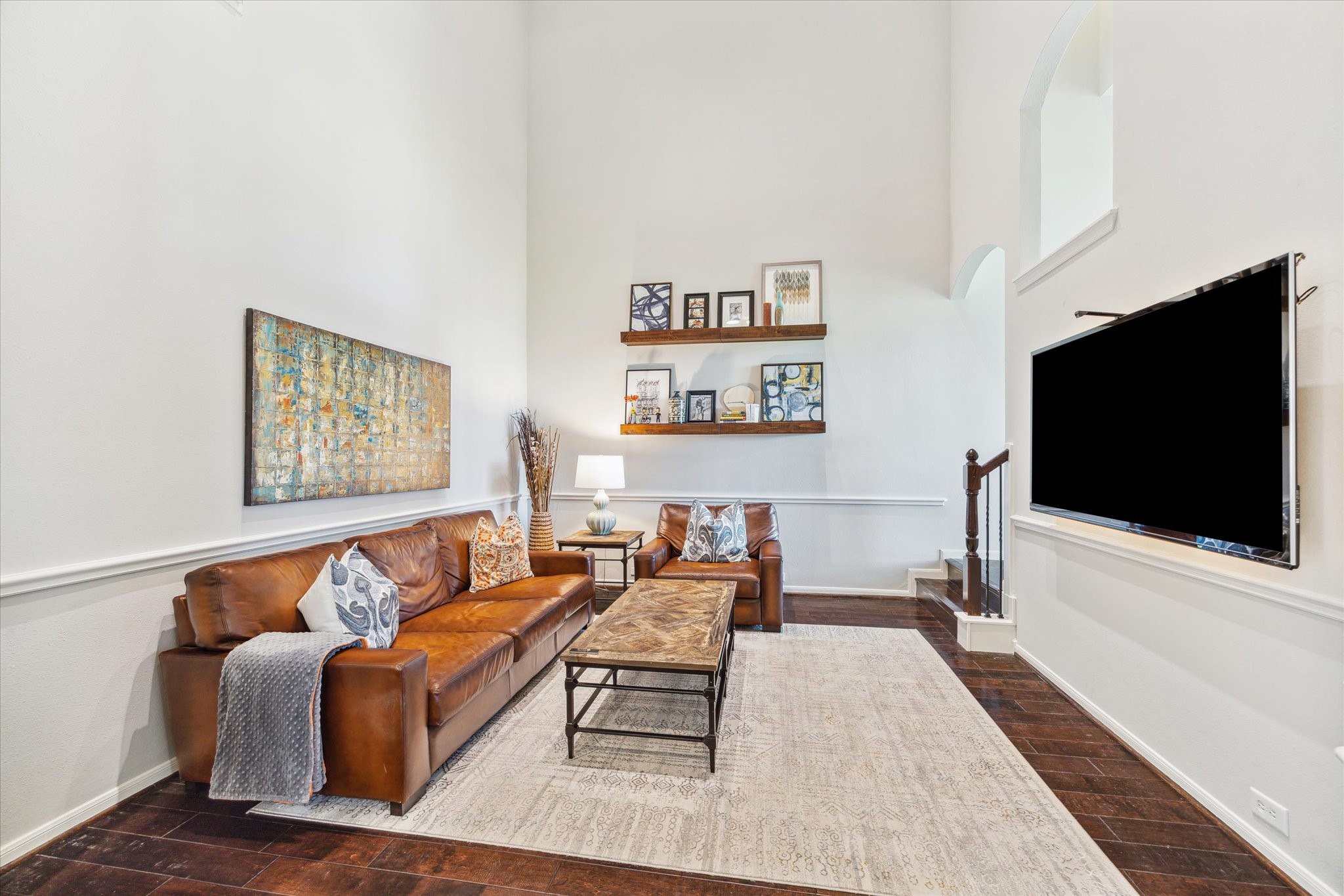 3310 Spring Landing Lane Pearland, TX 77584 - Photo 4 of 32 Dining room (currently shown as a Living room) angle showing the vertical scale of the space, updated flooring, and an easy entertainment layout.