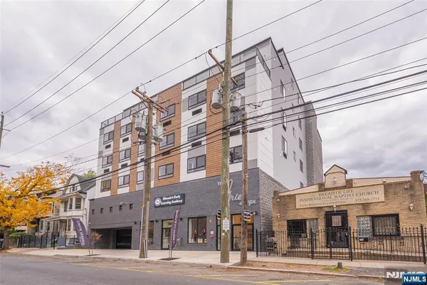 a view of a building and a street