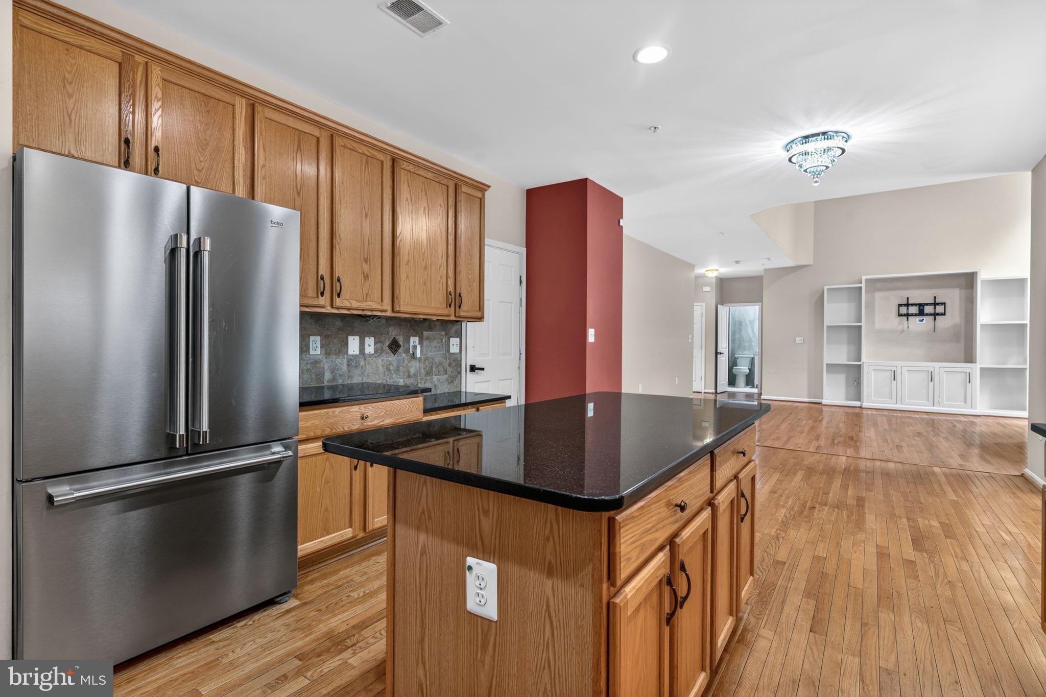 1200 Strausberg Street Accokeek, MD 20607 - Photo 8 of 47 Renovated Kitchen w/ granite tops & SS appliances