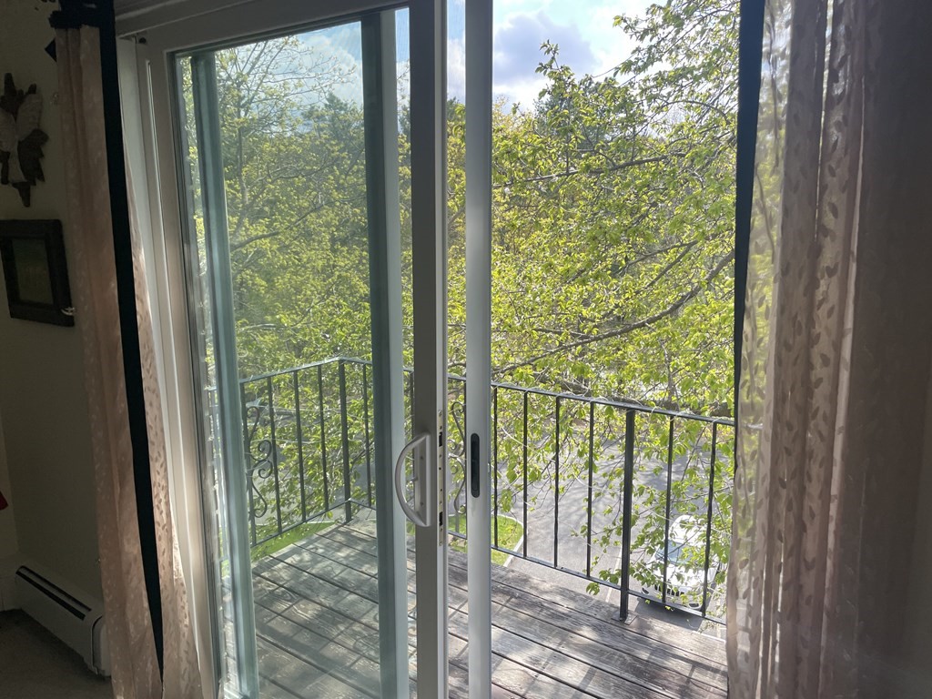 205 Great Road, Unit C8 Acton, MA 01720 - Photo 11 of 34 a view of a room with windows