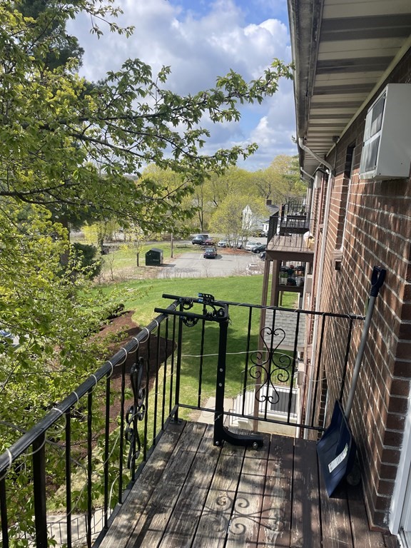 205 Great Road, Unit C8 Acton, MA 01720 - Photo 32 of 34 a view of a balcony with lake view