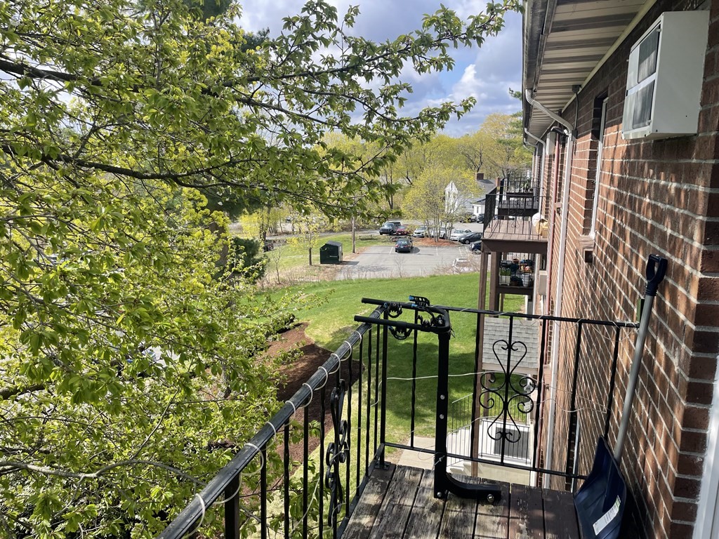 205 Great Road, Unit C8 Acton, MA 01720 - Photo 33 of 34 a view of street from balcony