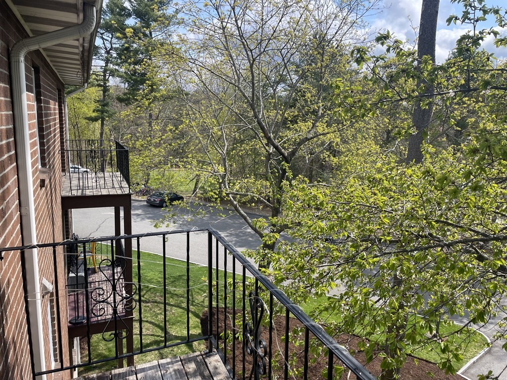 205 Great Road, Unit C8 Acton, MA 01720 - Photo 34 of 34 a view of a balcony with an outdoor space