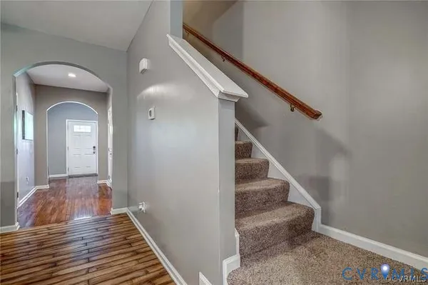 a picture of a bathroom with a shower and a toilet