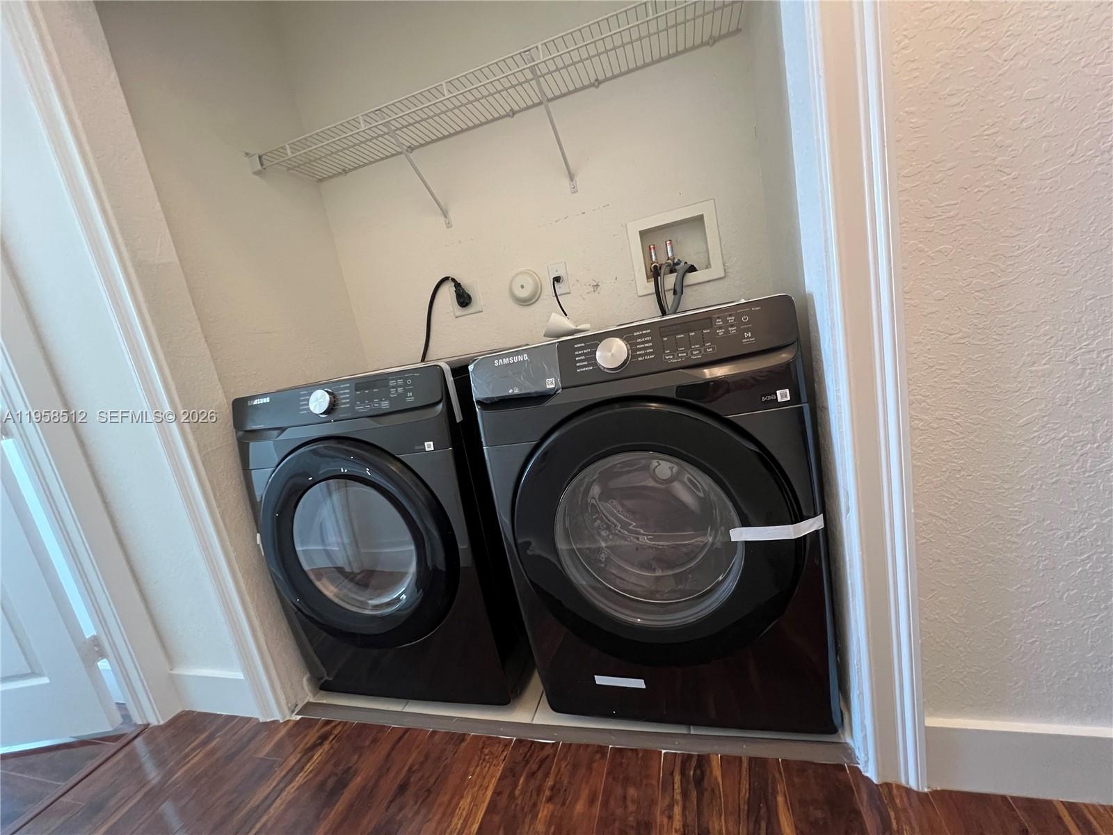 8001 West 36th Avenue, Unit 1 Hialeah, FL 33018 - Photo 12 of 48 a view of washer and dryer in a utility room