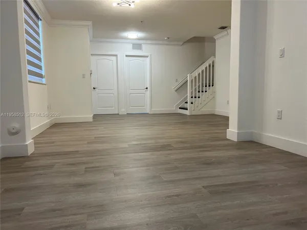 a bathroom with a sink and a shower