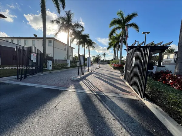 a view of a backyard with a patio