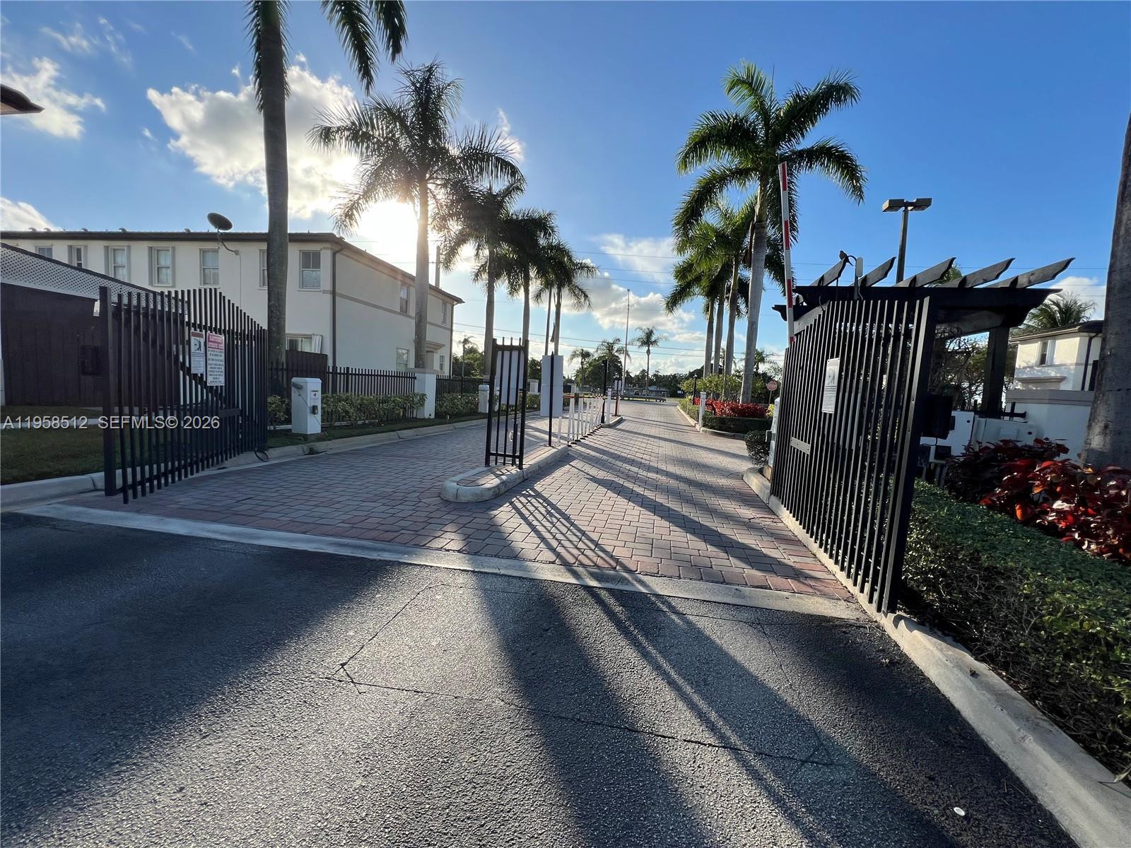 8001 West 36th Avenue, Unit 1 Hialeah, FL 33018 - Photo 3 of 48 a view of a backyard with a patio