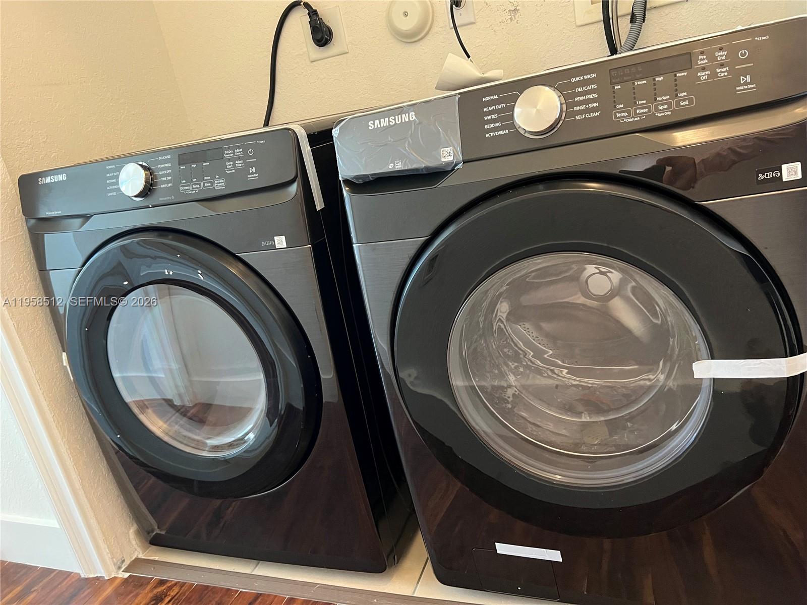8001 West 36th Avenue, Unit 1 Hialeah, FL 33018 - Photo 33 of 48 a close view of washer and dryer