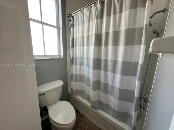 a view of a hallway with lots of green space