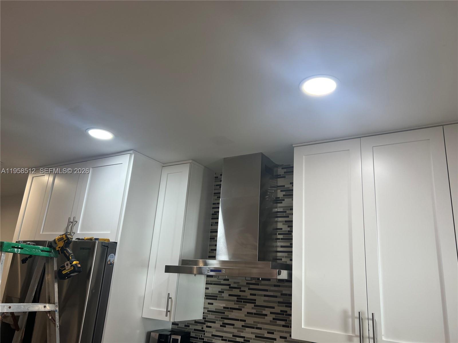 8001 West 36th Avenue, Unit 1 Hialeah, FL 33018 - Photo 45 of 48 a view of a hallway with lots of green space