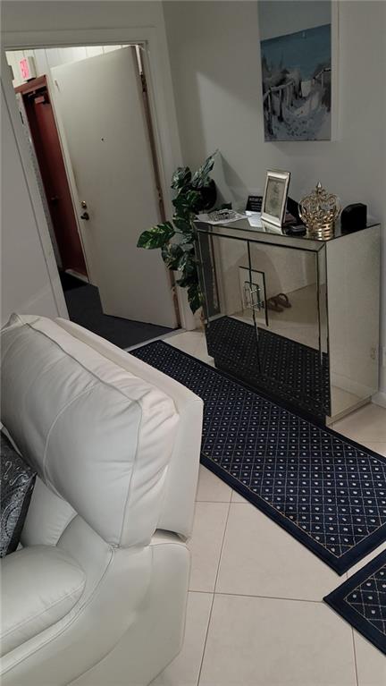 6574 Burning Wood Drive, Unit 101 Boca Raton, FL 33433 - Photo 15 of 25 a living room with a couch