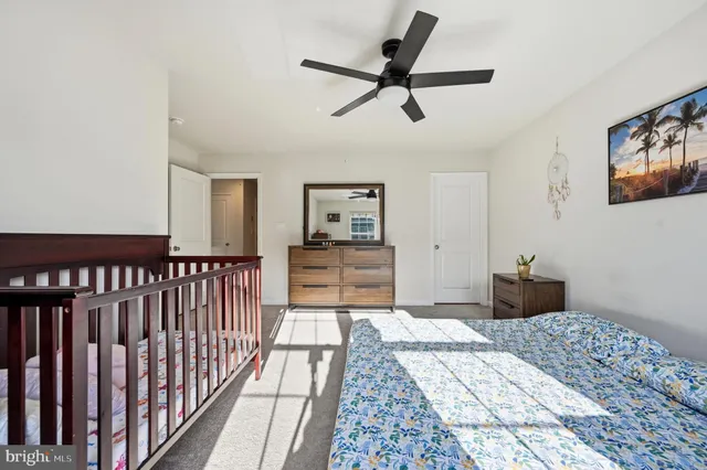 a bedroom with furniture and a bed