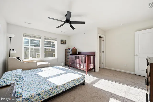 a view of a car park in front of house