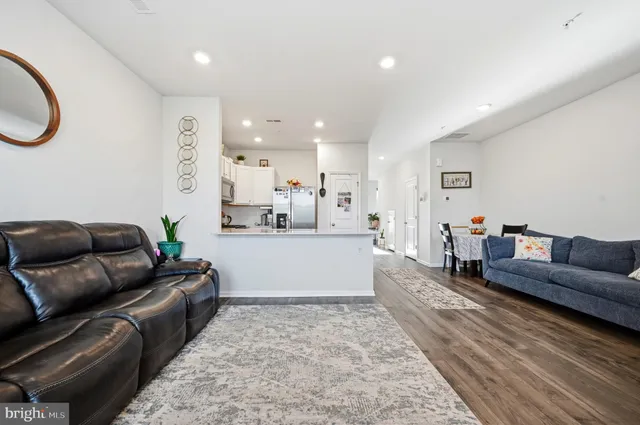 a living room with furniture and a couch