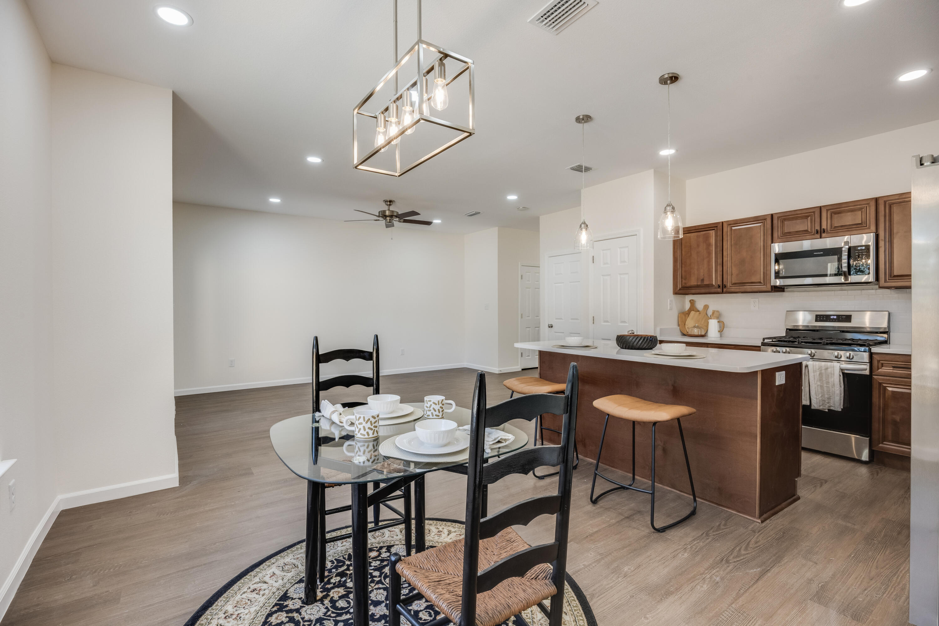751 Amos Street, Unit A AND B Crestview, FL 32539 - Photo 14 of 47 a kitchen with stainless steel appliances kitchen island granite countertop a sink and cabinets