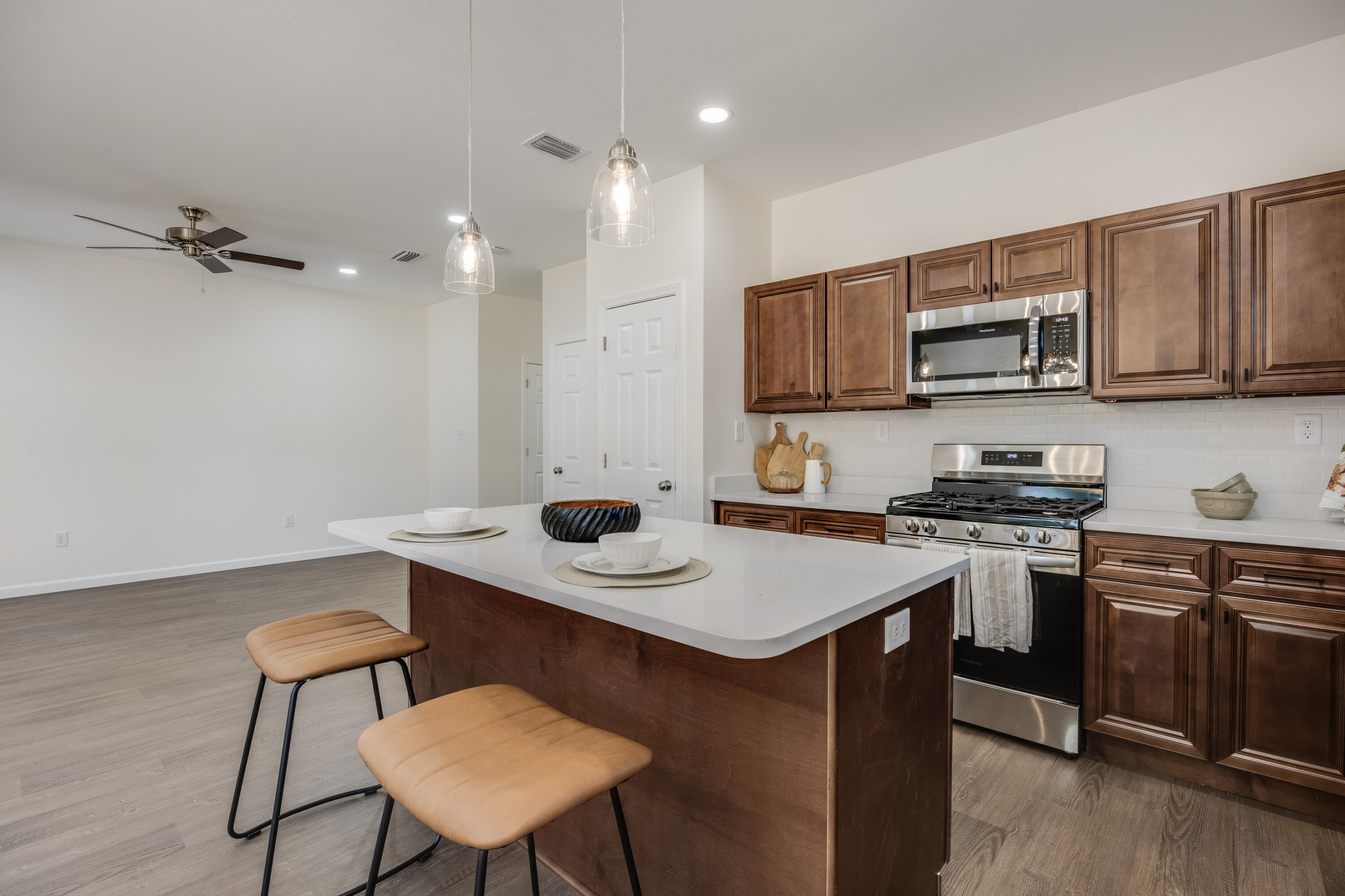 751 Amos Street, Unit A AND B Crestview, FL 32539 - Photo 15 of 47 a kitchen with a stove a sink and a refrigerator