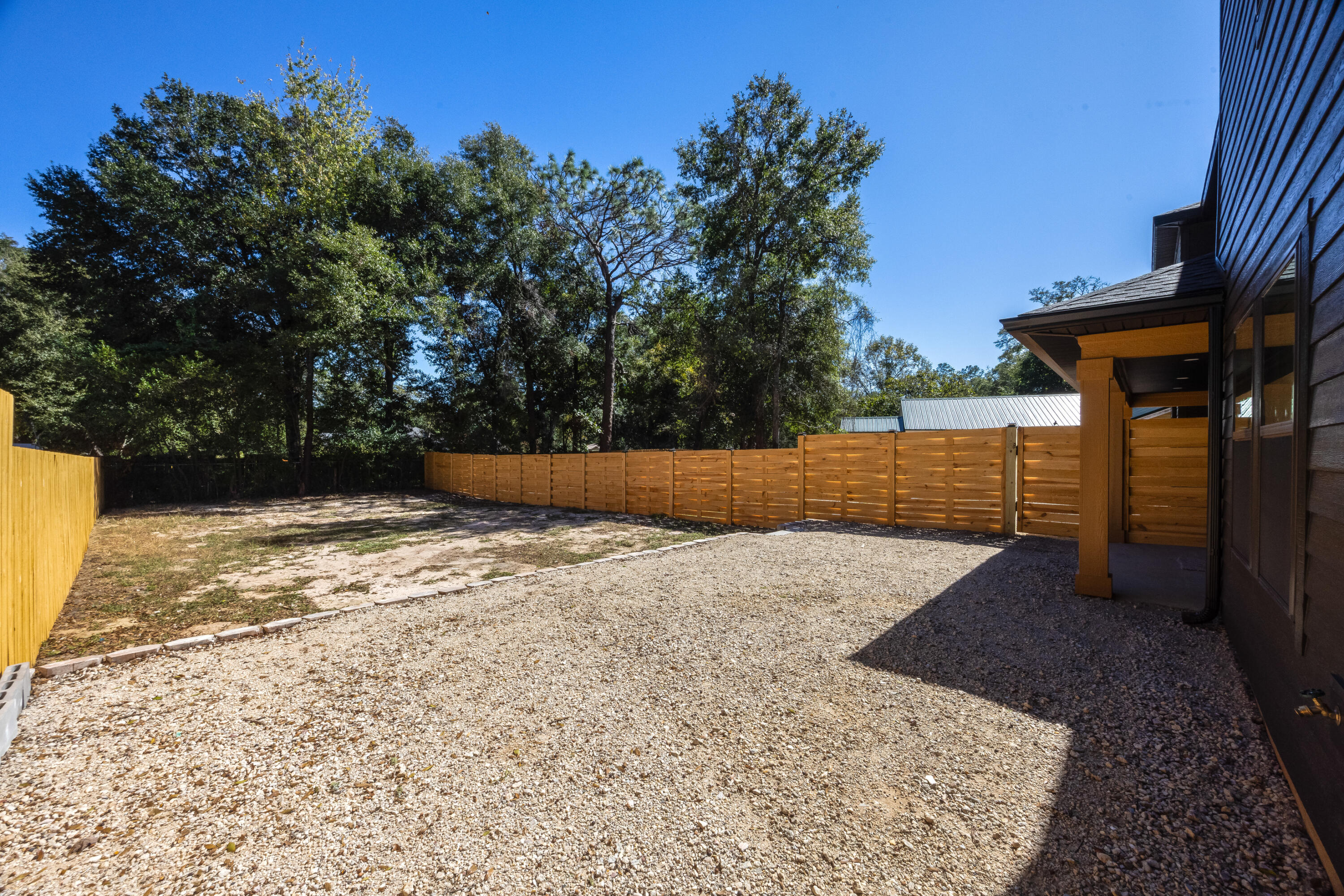 751 Amos Street, Unit A AND B Crestview, FL 32539 - Photo 17 of 47 a backyard of a house