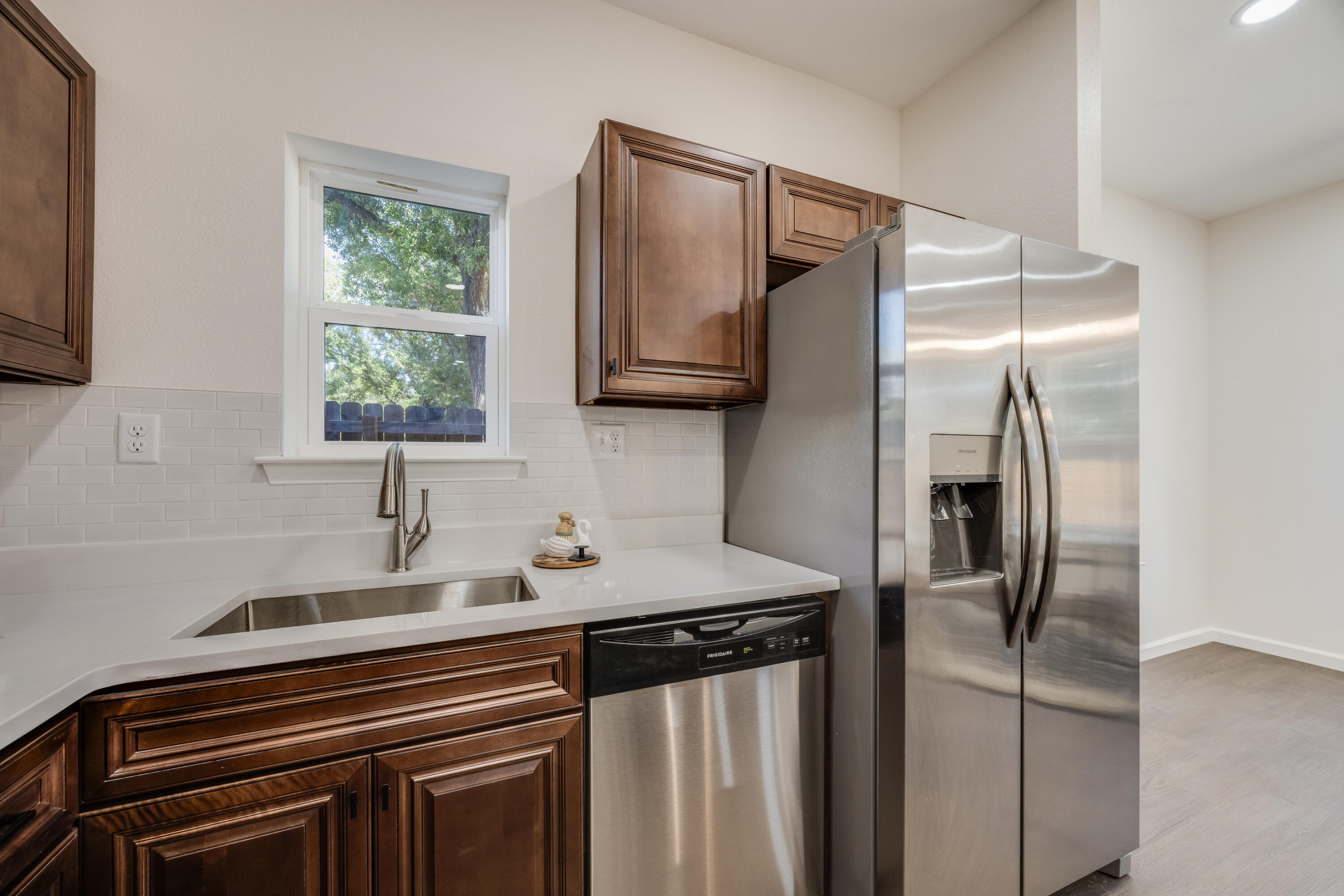 751 Amos Street, Unit A AND B Crestview, FL 32539 - Photo 20 of 47 a kitchen with stainless steel appliances granite countertop a refrigerator and a sink