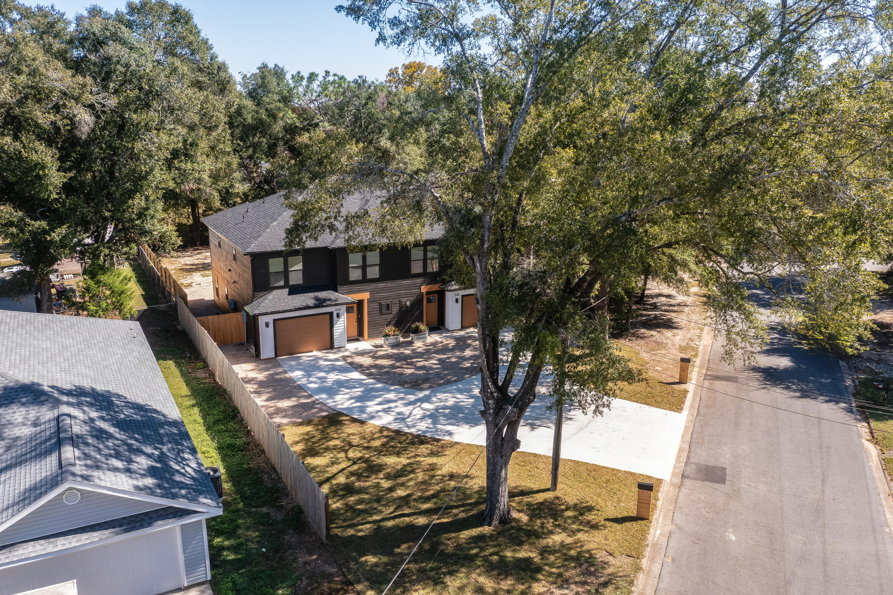751 Amos Street, Unit A AND B Crestview, FL 32539 - Photo 2 of 47 a view of a house with large trees