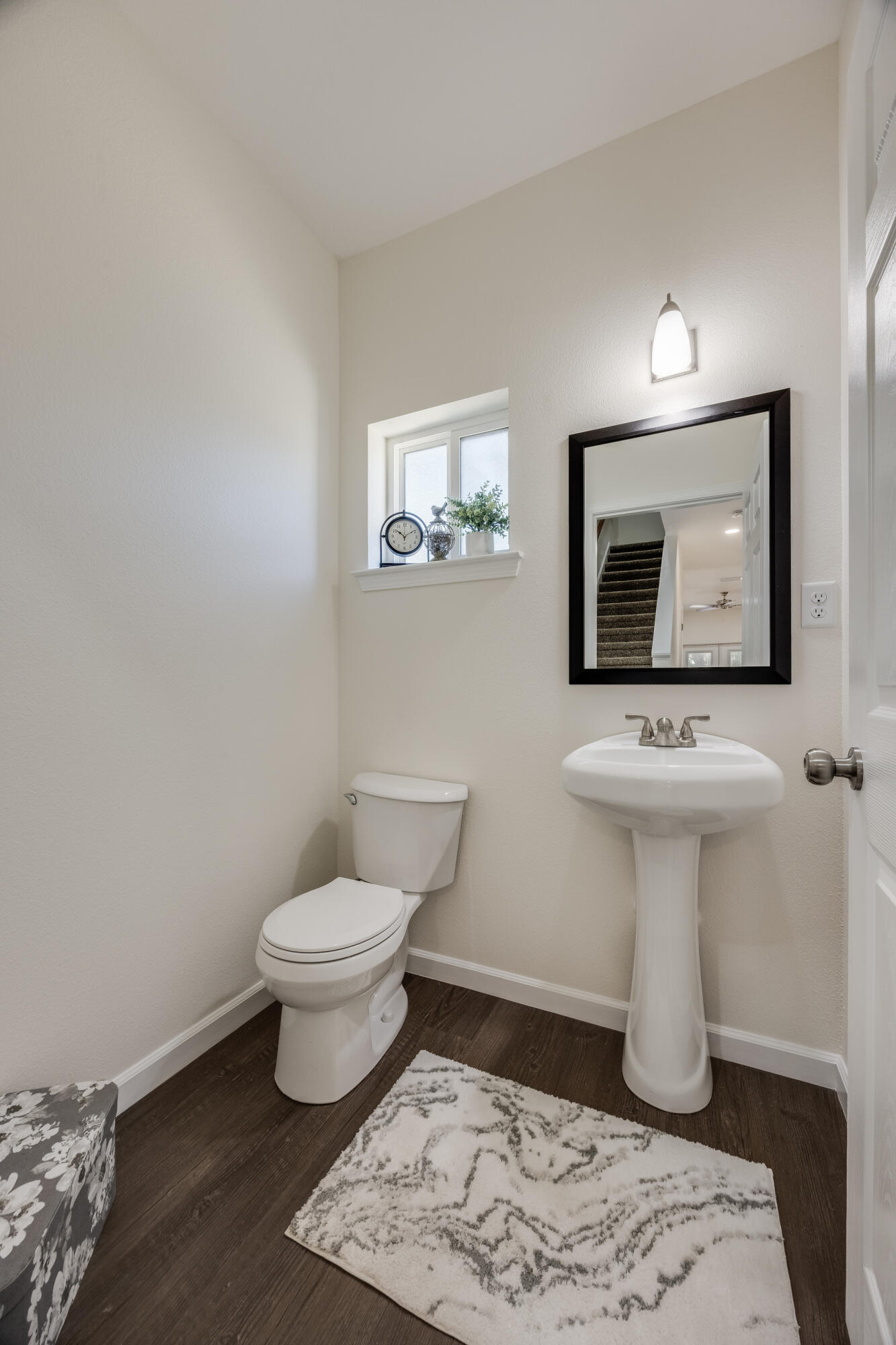 751 Amos Street, Unit A AND B Crestview, FL 32539 - Photo 23 of 47 a bathroom with a toilet sink and mirror