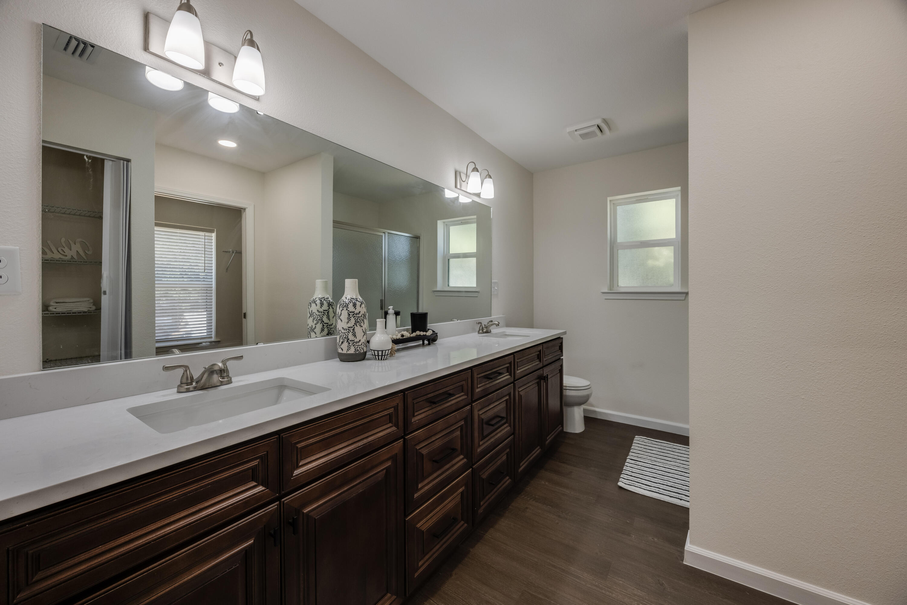 751 Amos Street, Unit A AND B Crestview, FL 32539 - Photo 29 of 47 a bathroom with a double vanity sink and a mirror