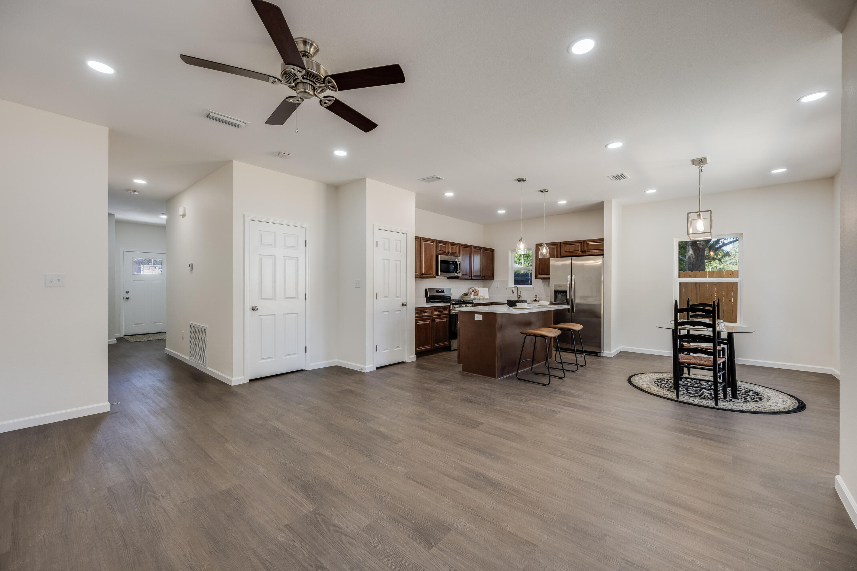 751 Amos Street, Unit A AND B Crestview, FL 32539 - Photo 6 of 47 a living room with stainless steel appliances kitchen island furniture and a view of kitchen