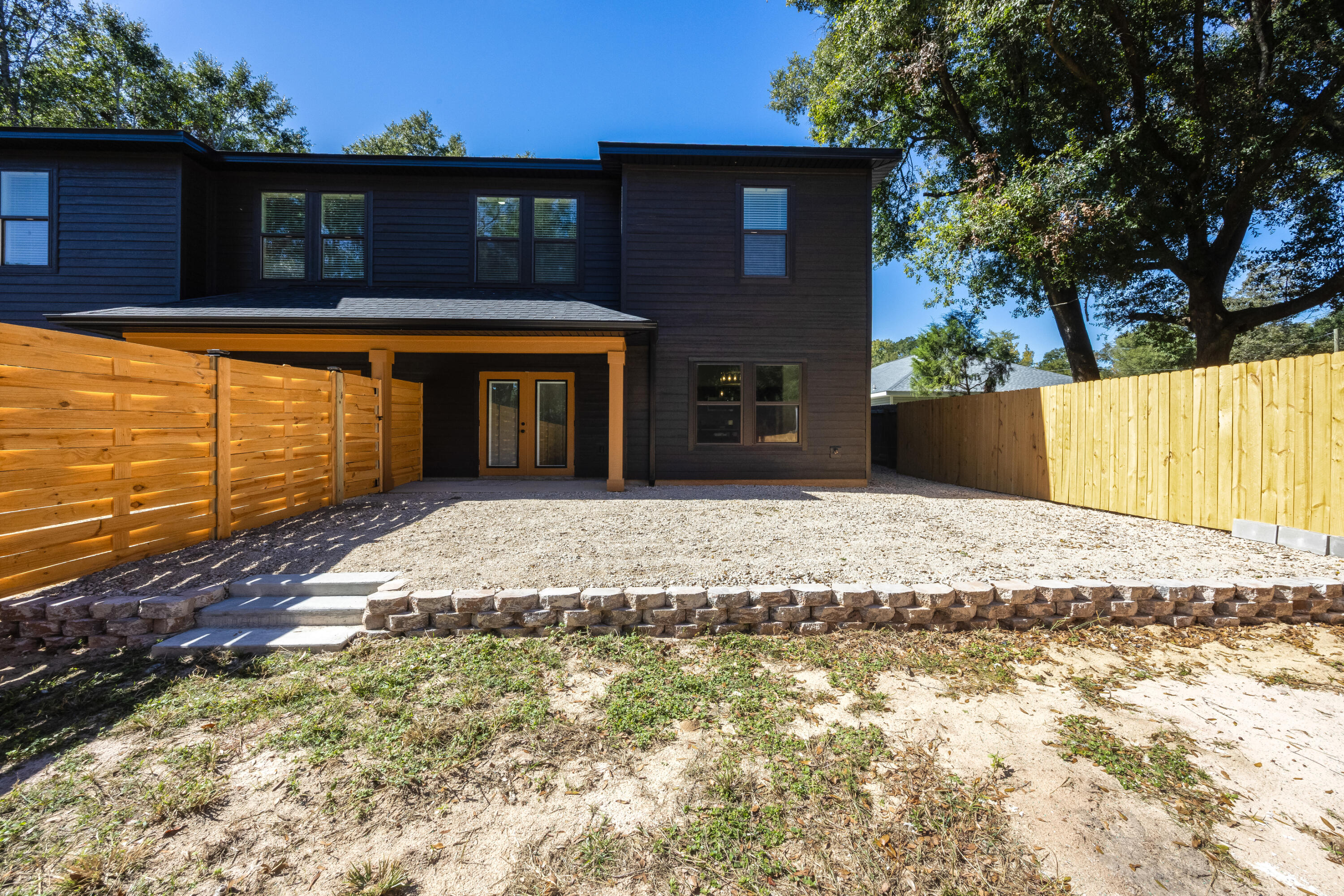 751 Amos Street, Unit A AND B Crestview, FL 32539 - Photo 8 of 47 a front view of a house with a yard