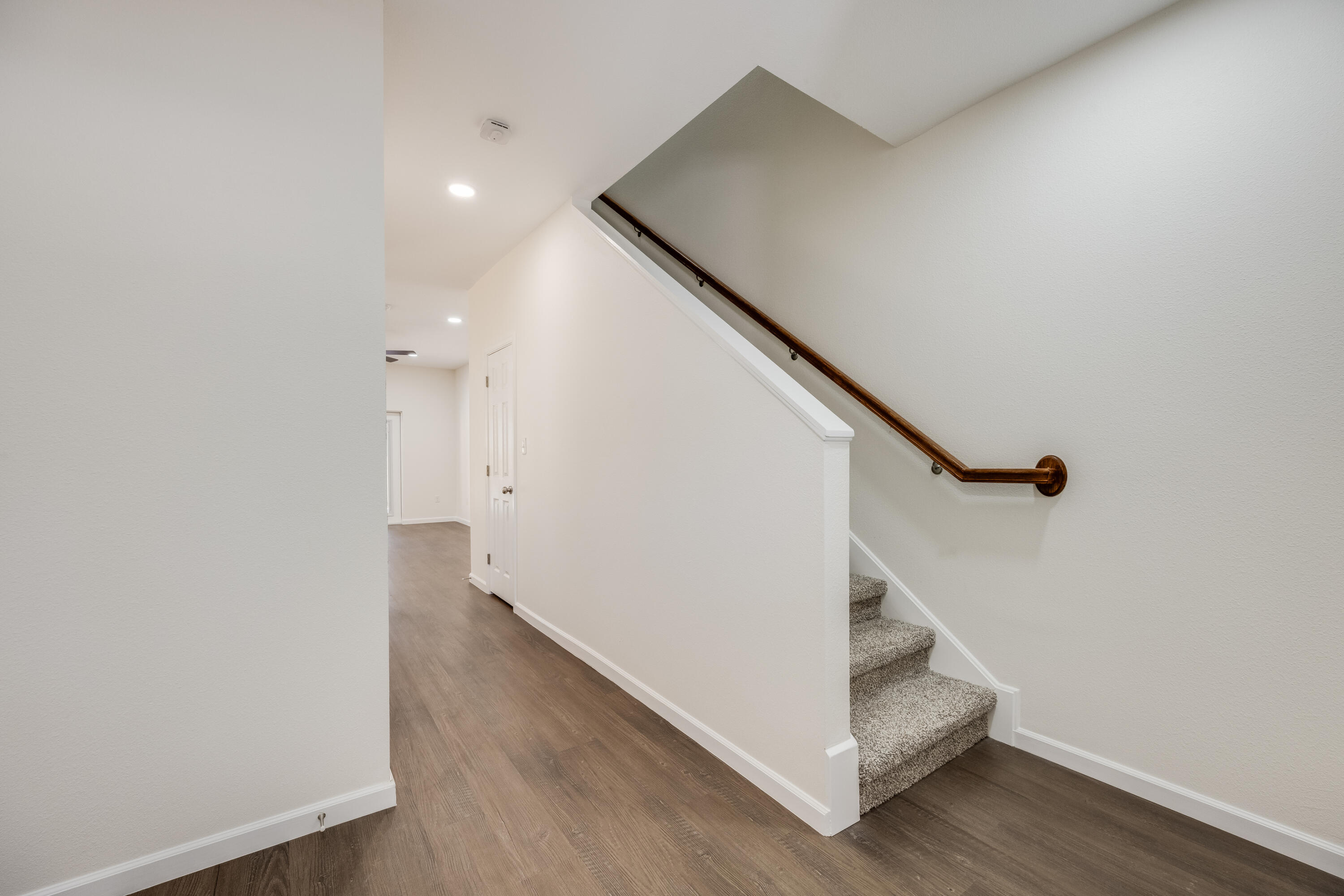751 Amos Street, Unit A AND B Crestview, FL 32539 - Photo 10 of 47 a view of entryway and hall with wooden floor